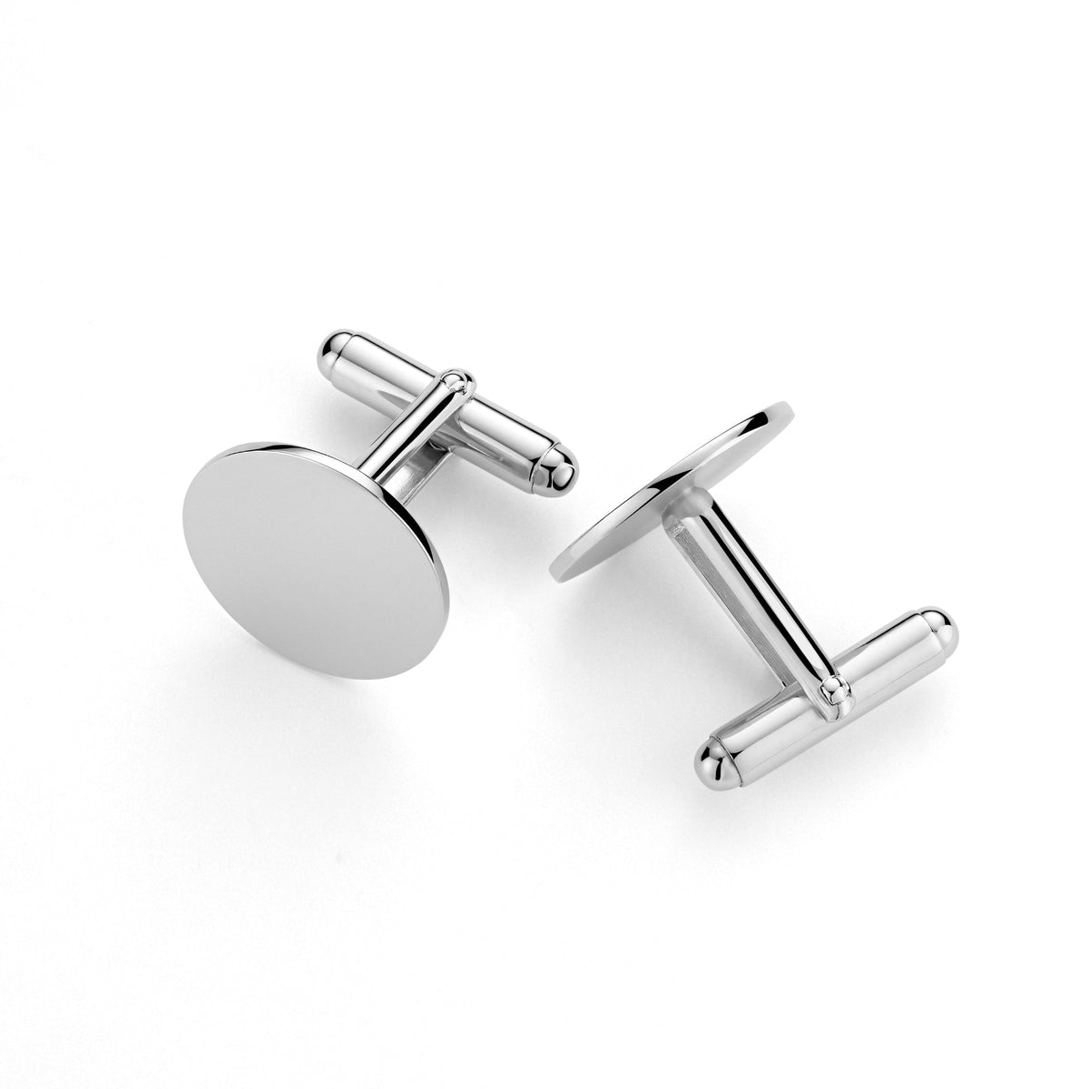 Angled view of two round sterling silver cufflinks with toggle fastenings.